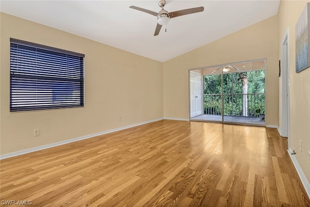 empty room featuring lofted ceiling, light hardwood / wood-style floors, and ceiling fan