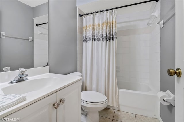 full bathroom featuring tile flooring, large vanity, toilet, and shower / bathtub combination with curtain