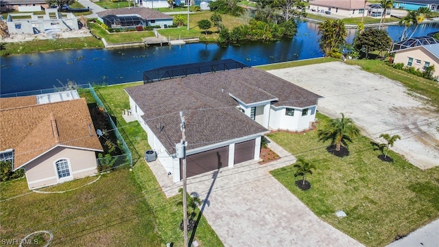 birds eye view of property featuring a water view