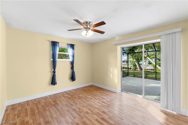 spare room with ceiling fan and light hardwood / wood-style flooring