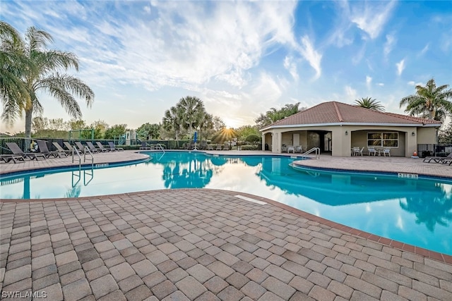 view of swimming pool featuring a patio area