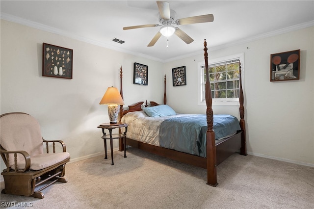 carpeted bedroom with crown molding and ceiling fan