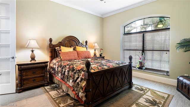 bedroom with crown molding