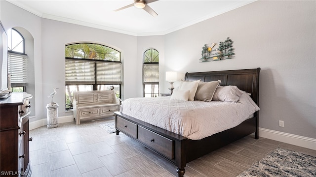 bedroom with ceiling fan and ornamental molding