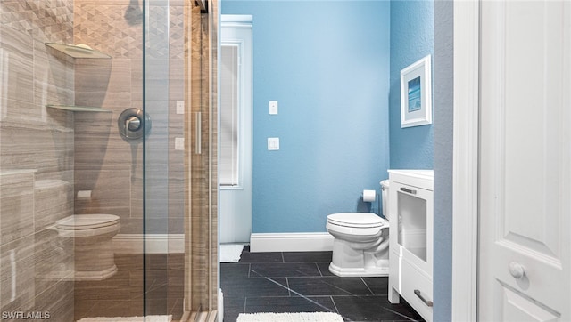 bathroom with toilet, tile flooring, an enclosed shower, and vanity