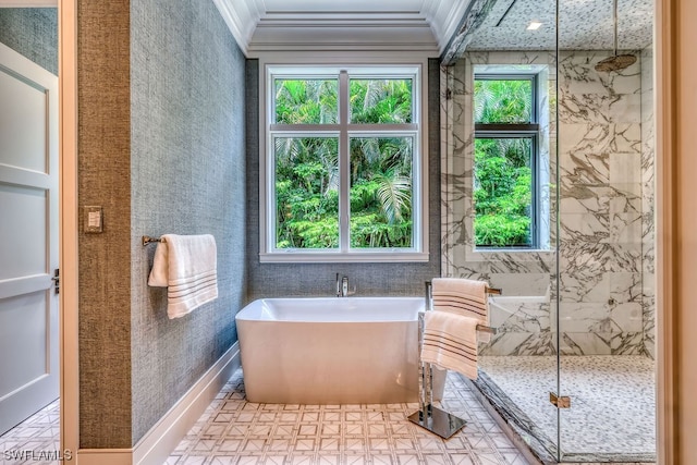 bathroom with ornamental molding, separate shower and tub, and tile flooring