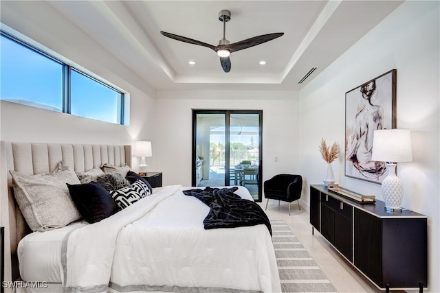 bedroom featuring recessed lighting, a ceiling fan, visible vents, access to exterior, and a raised ceiling