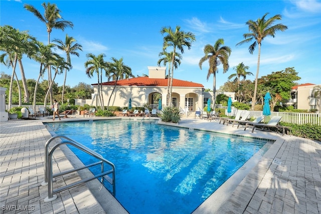 view of swimming pool featuring a patio