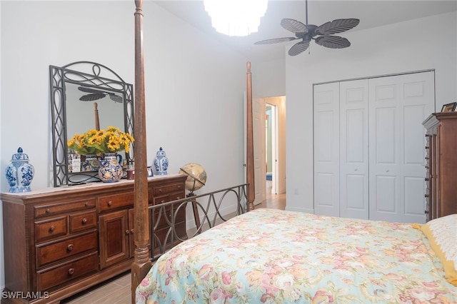 bedroom featuring ceiling fan, a closet, and light wood-type flooring