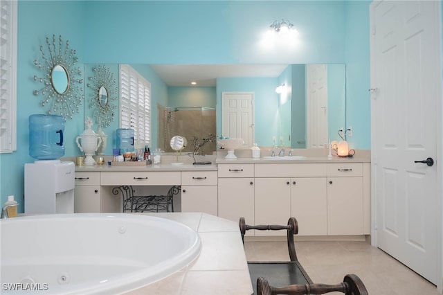 bathroom with vanity, tile patterned flooring, and shower with separate bathtub