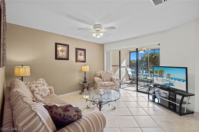 living room featuring ceiling fan and light tile patterned floors