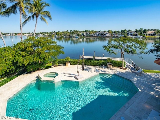 view of pool featuring a water view, an in ground hot tub, and a patio