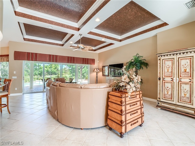 tiled living room with beam ceiling, coffered ceiling, ceiling fan, and a tray ceiling