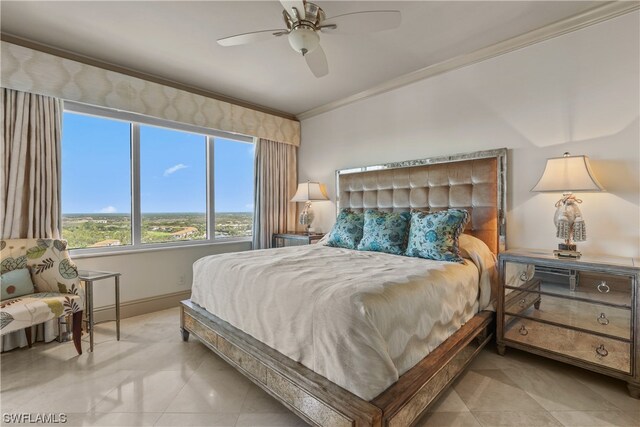 bedroom with ornamental molding, ceiling fan, and light tile floors