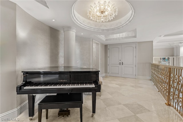 misc room with a raised ceiling, an inviting chandelier, and light tile floors