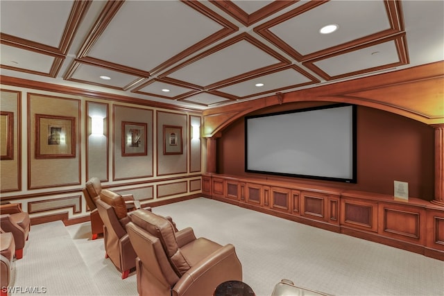 home theater featuring light carpet and coffered ceiling