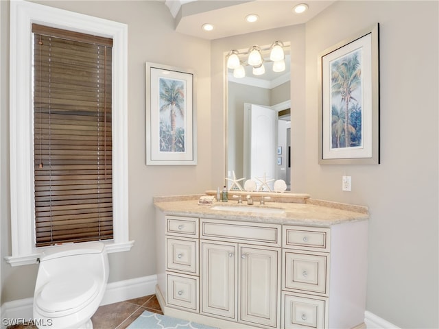 bathroom with crown molding, tile patterned flooring, vanity, and toilet