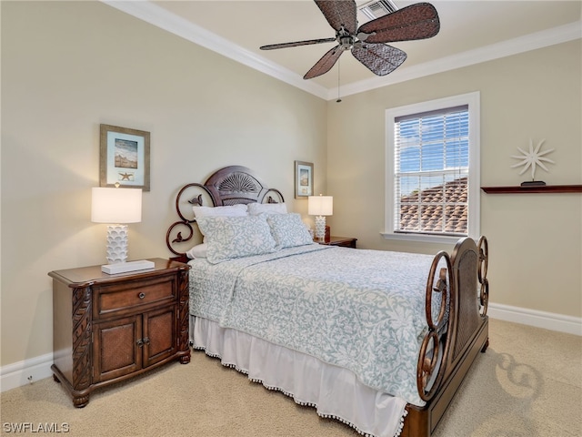 bedroom with light carpet, ceiling fan, and crown molding