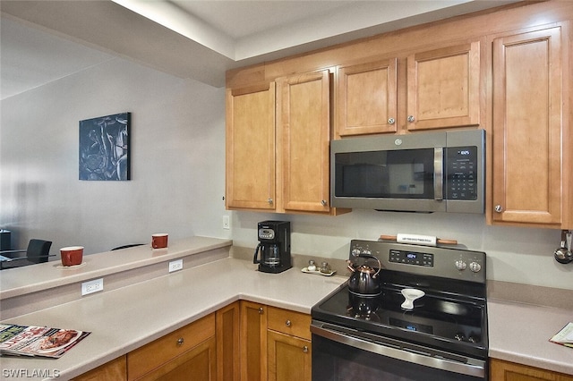 kitchen with appliances with stainless steel finishes