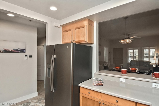 kitchen with light tile patterned flooring and stainless steel fridge with ice dispenser