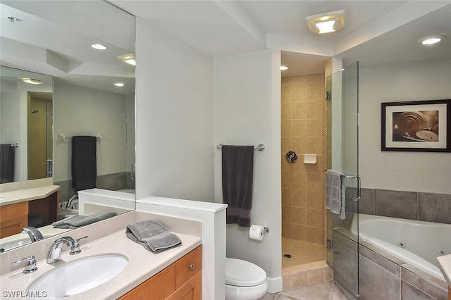 full bathroom with vanity, tile patterned flooring, toilet, and separate shower and tub