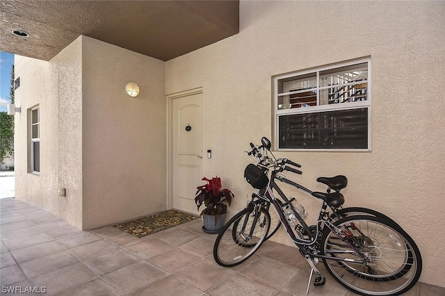 property entrance featuring a patio