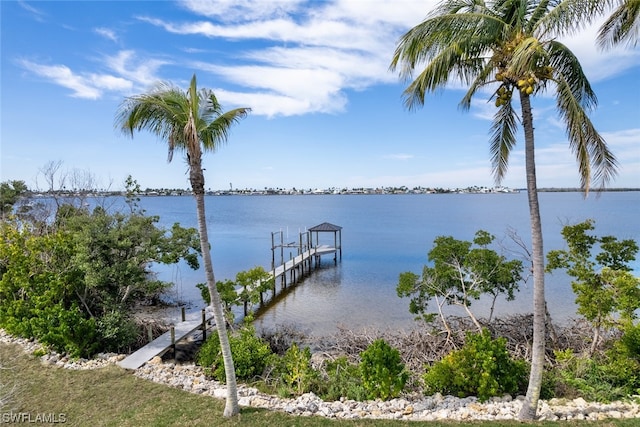 view of dock with a water view