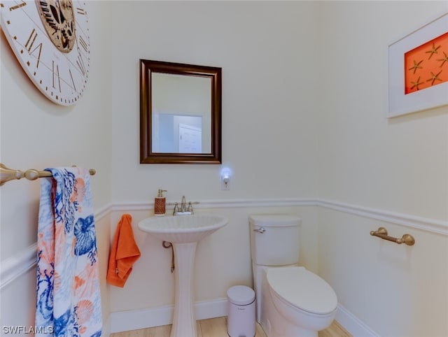 bathroom featuring toilet