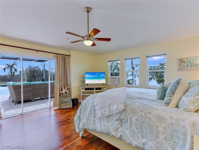 bedroom with ceiling fan and hardwood / wood-style flooring