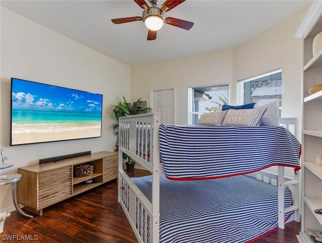 bedroom featuring ceiling fan and dark wood-type flooring