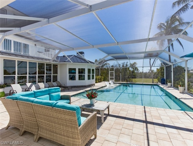 view of pool with an outdoor hangout area, a lanai, and a patio