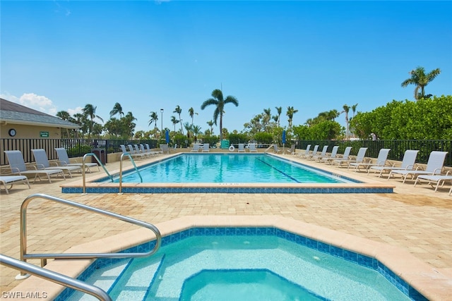 view of pool featuring a patio area