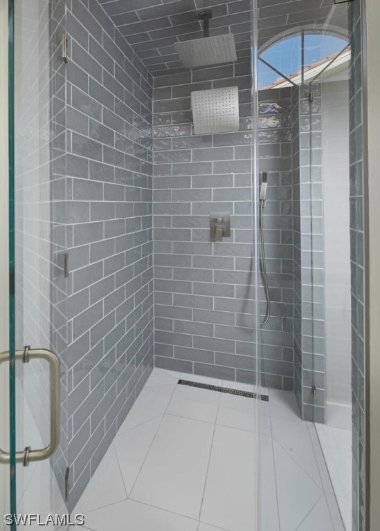 bathroom featuring an enclosed shower