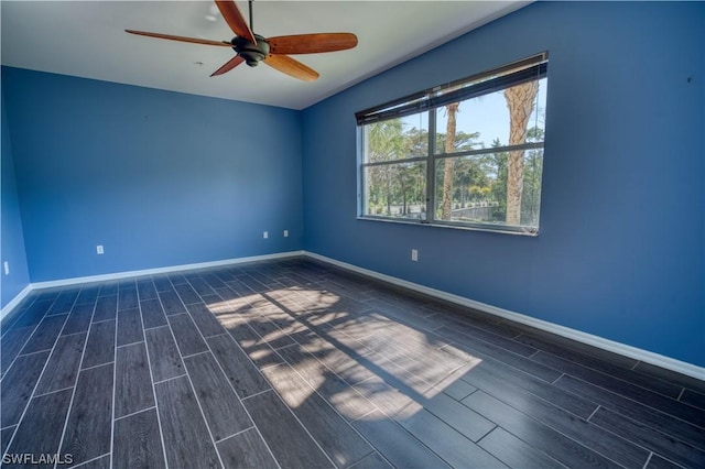 spare room with ceiling fan