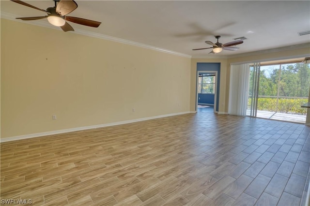 empty room featuring ornamental molding and ceiling fan