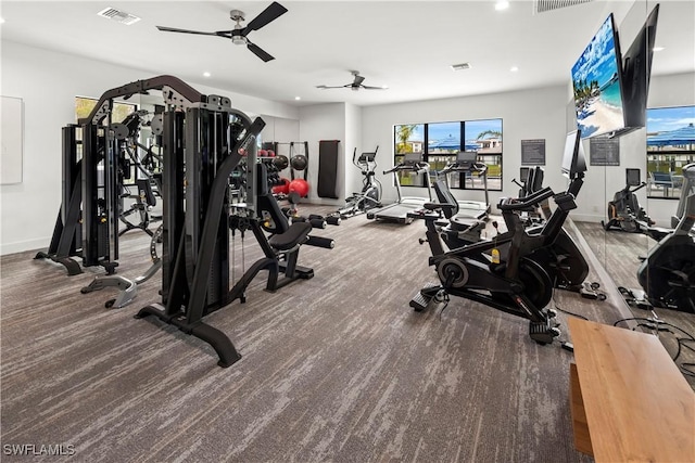 exercise room featuring visible vents, recessed lighting, baseboards, and a ceiling fan