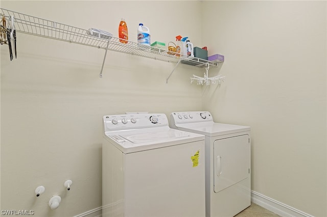 washroom featuring separate washer and dryer