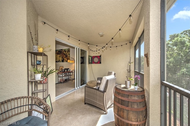 sunroom with track lighting