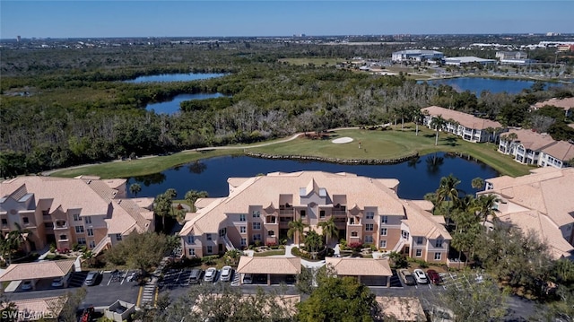 drone / aerial view with a water view