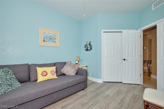 living room with hardwood / wood-style flooring