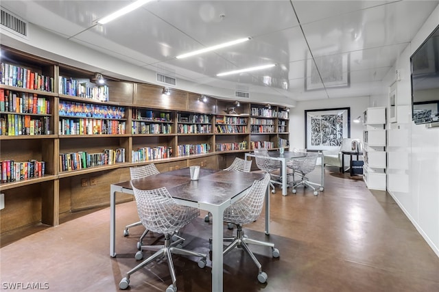 office with concrete flooring