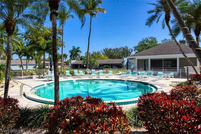 view of swimming pool with a patio