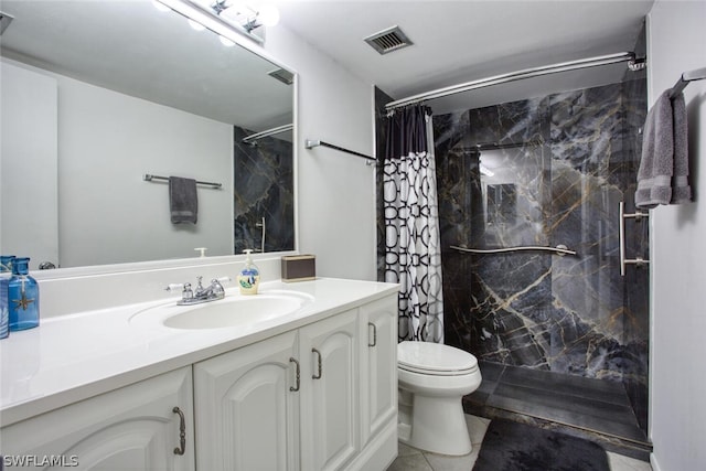 bathroom with tile patterned flooring, vanity, toilet, and a shower with curtain