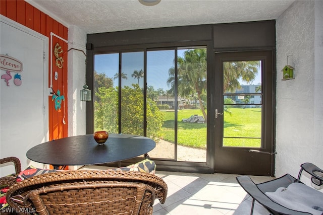 sunroom / solarium featuring plenty of natural light