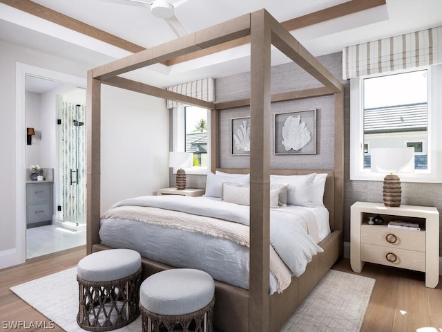 bedroom featuring multiple windows, ceiling fan, and light hardwood / wood-style flooring