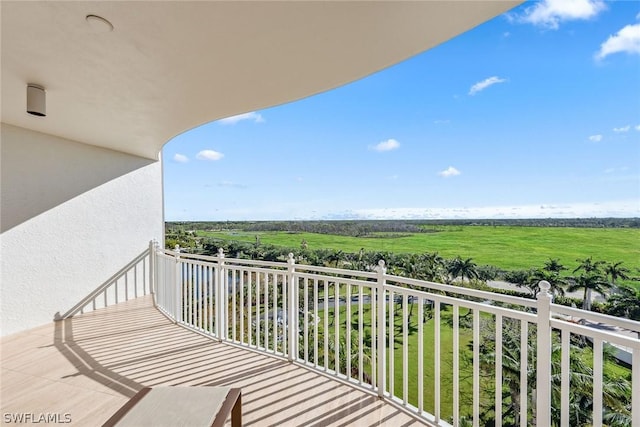 balcony featuring a rural view