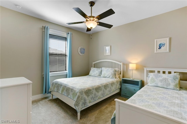 bedroom featuring light colored carpet and ceiling fan