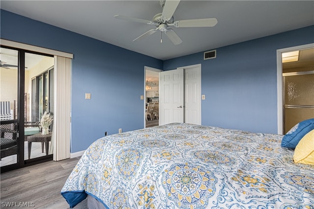 bedroom featuring light hardwood / wood-style floors and ceiling fan