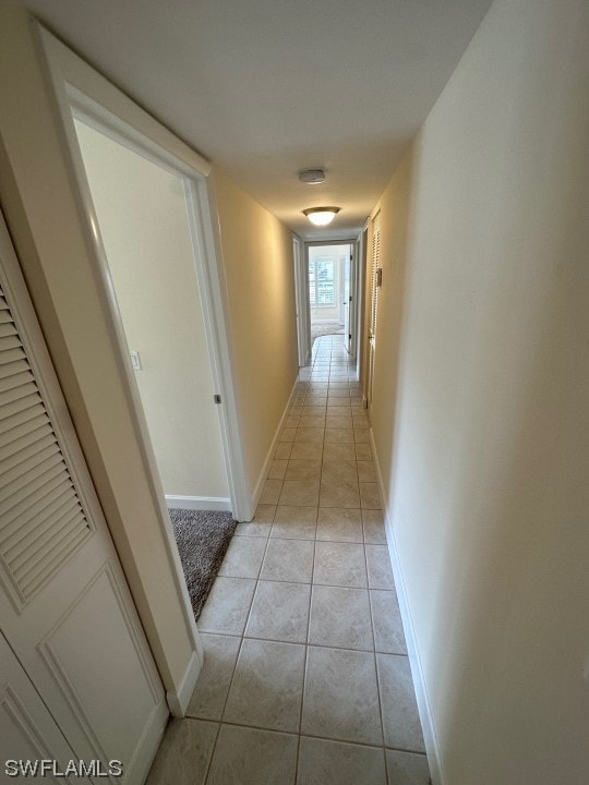 hallway with light tile flooring