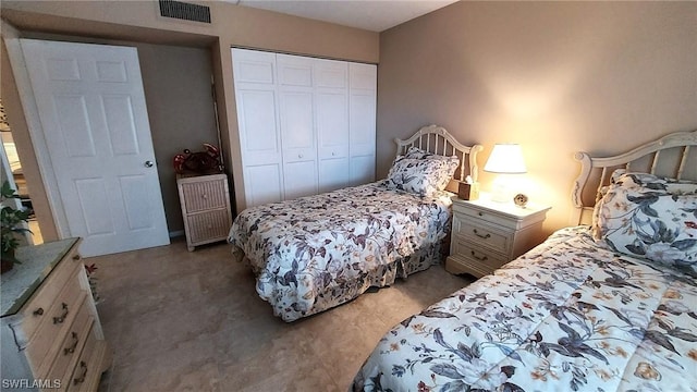 carpeted bedroom featuring a closet